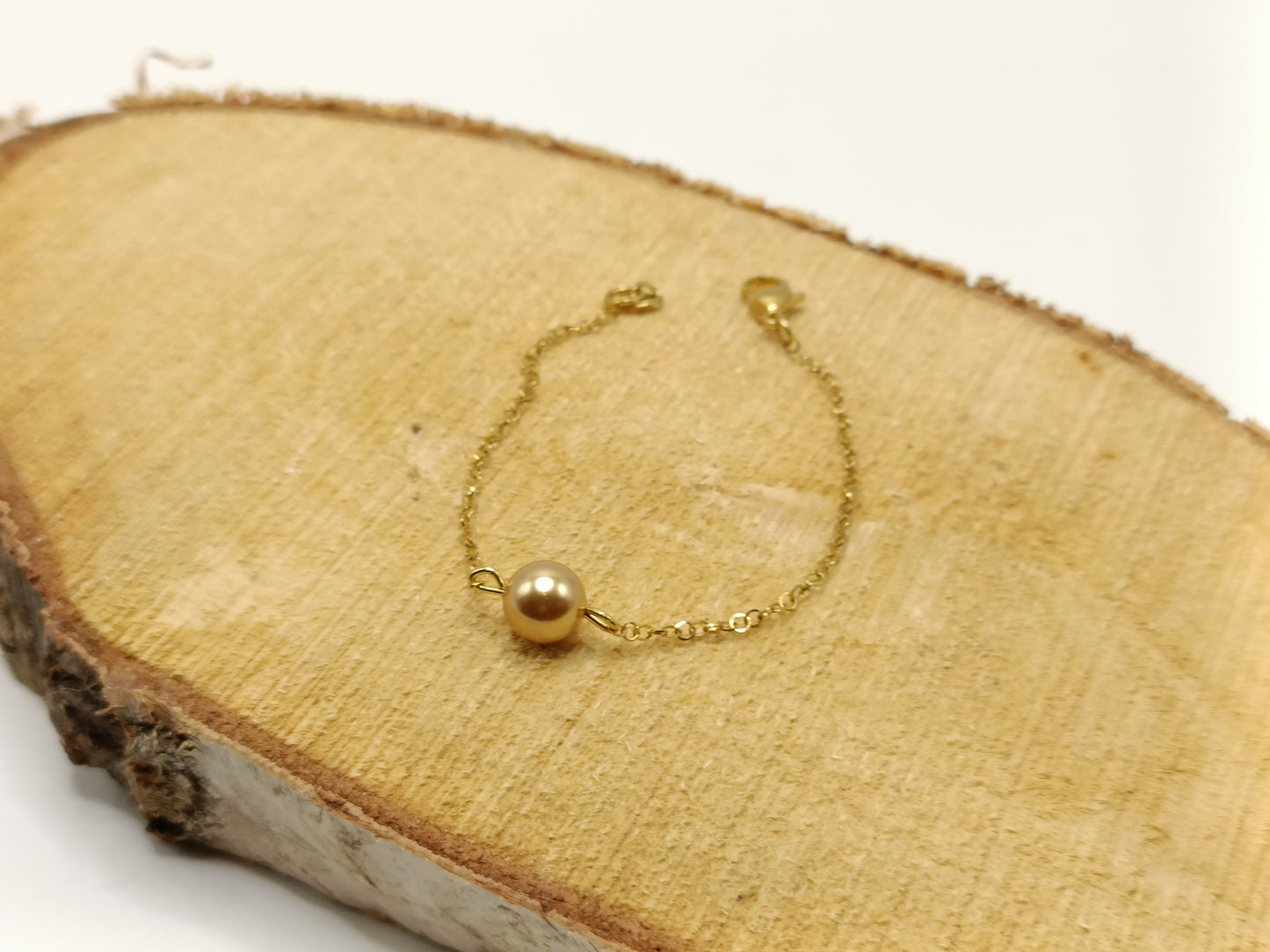 Bracelet fin doré et perle dorée, en acier inoxydable