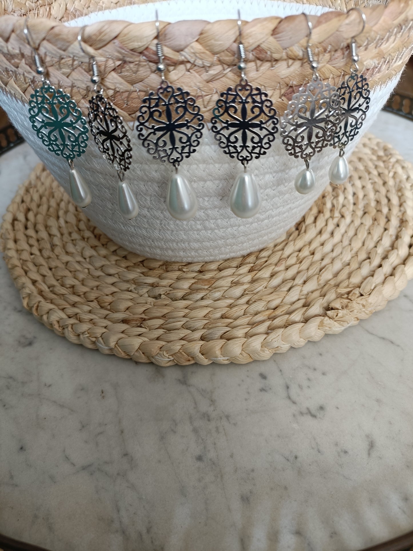 Ode, les estampes argentées et grandes gouttes