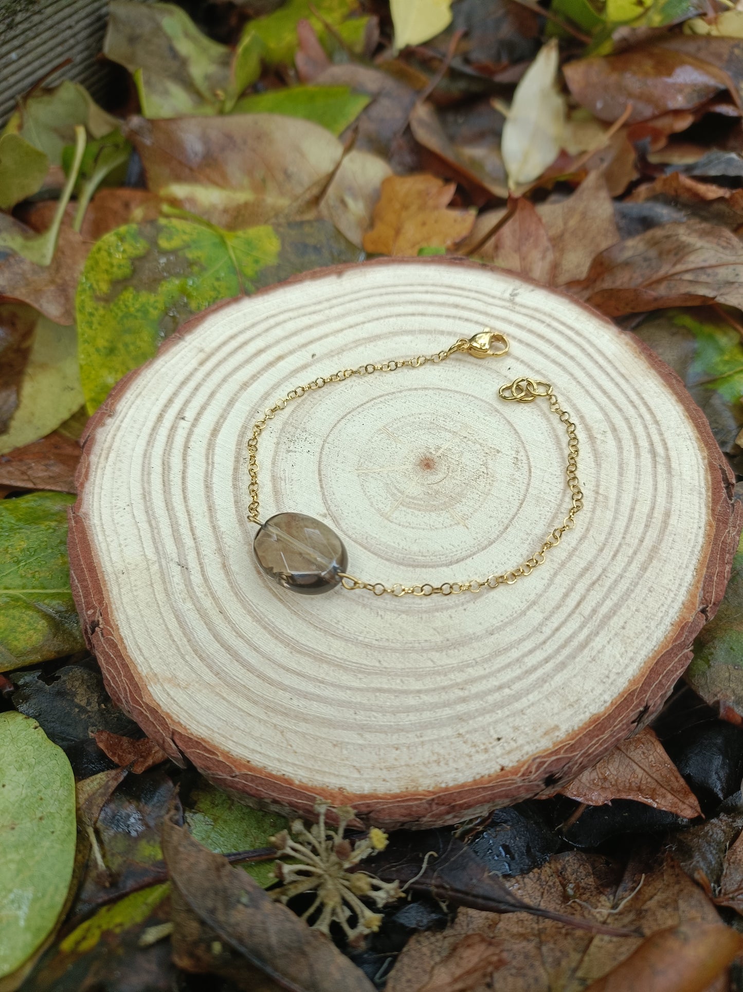 Bracelet doré en acier inoxydable et pierre naturelle en quartz fumé facetté