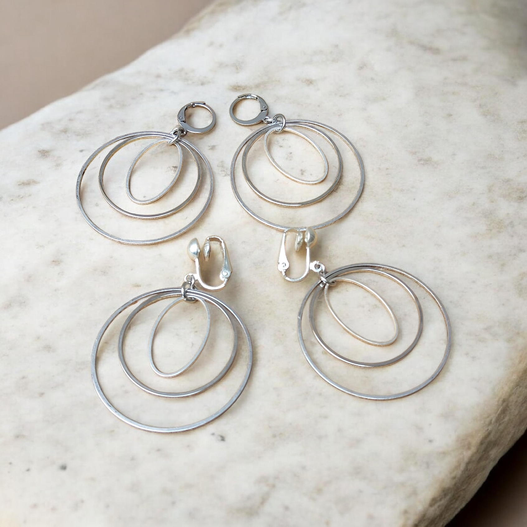 Circonvolution, les grandes boucles d'oreilles anneaux argentés triples, percées ou clips